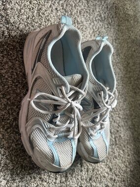 Baby Blue and white New Balance 530 women’s 8.5